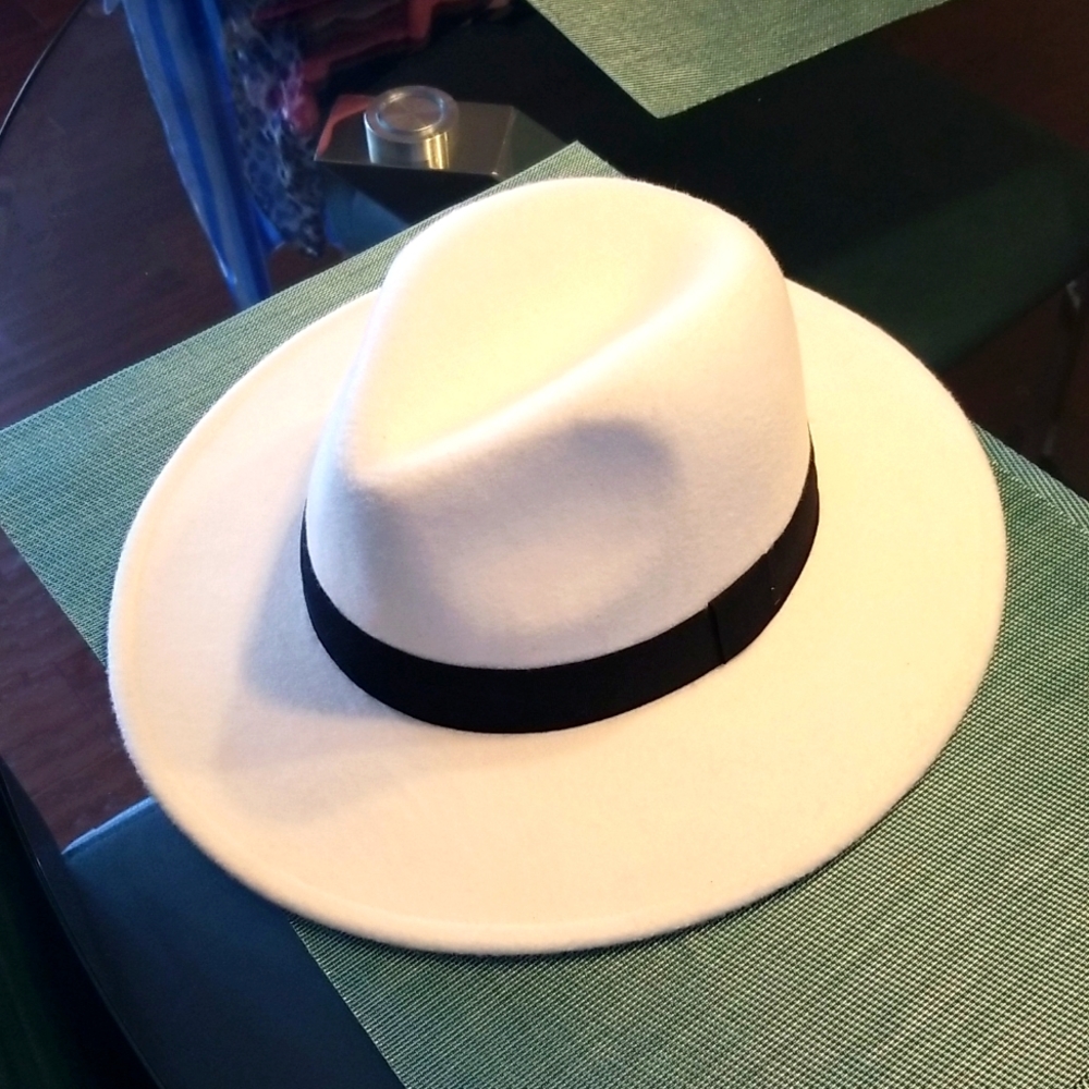 Beautiful white Fedora with black strap
